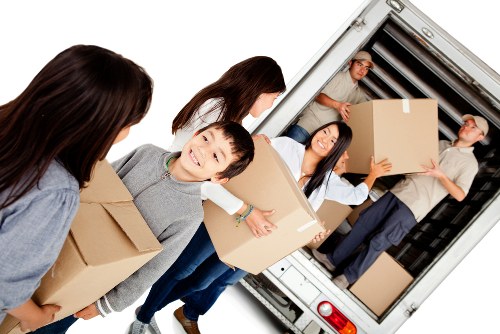 Furniture dismantling and workspace setup during office relocation in Bexleyheath