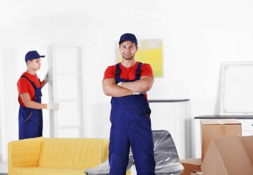 Professional movers working in a Bexleyheath apartment building