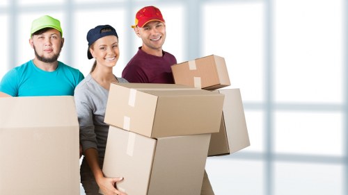 Professional team carrying out piano removals in Bexleyheath