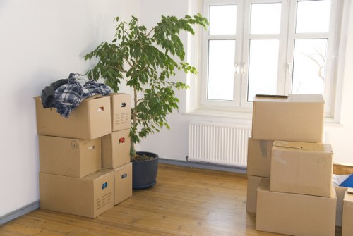 Packed office equipment ready for transport during a commercial move