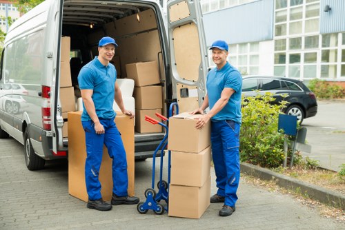 Packing and loading items into a van for transport