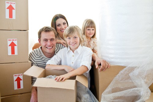 Local moving team loading furniture for a home relocation in Bexleyheath
