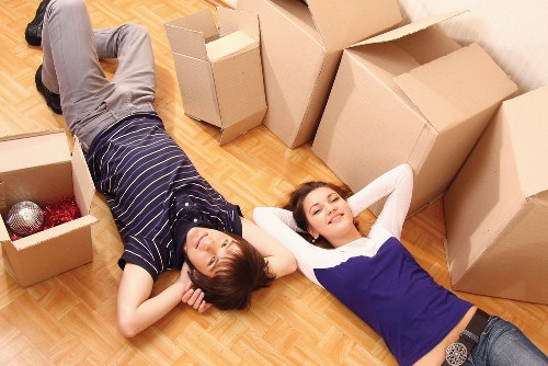 Loading household furniture into a removal van
