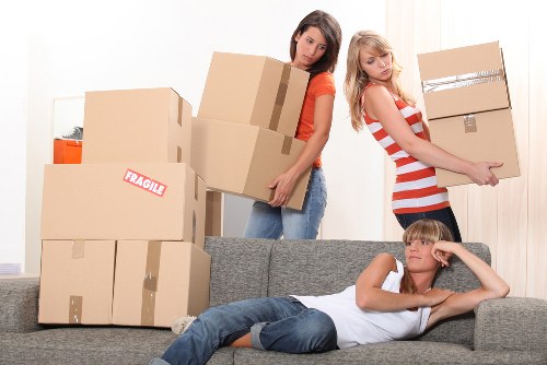 Local home removals team handling furniture loading for a Bexleyheath move
